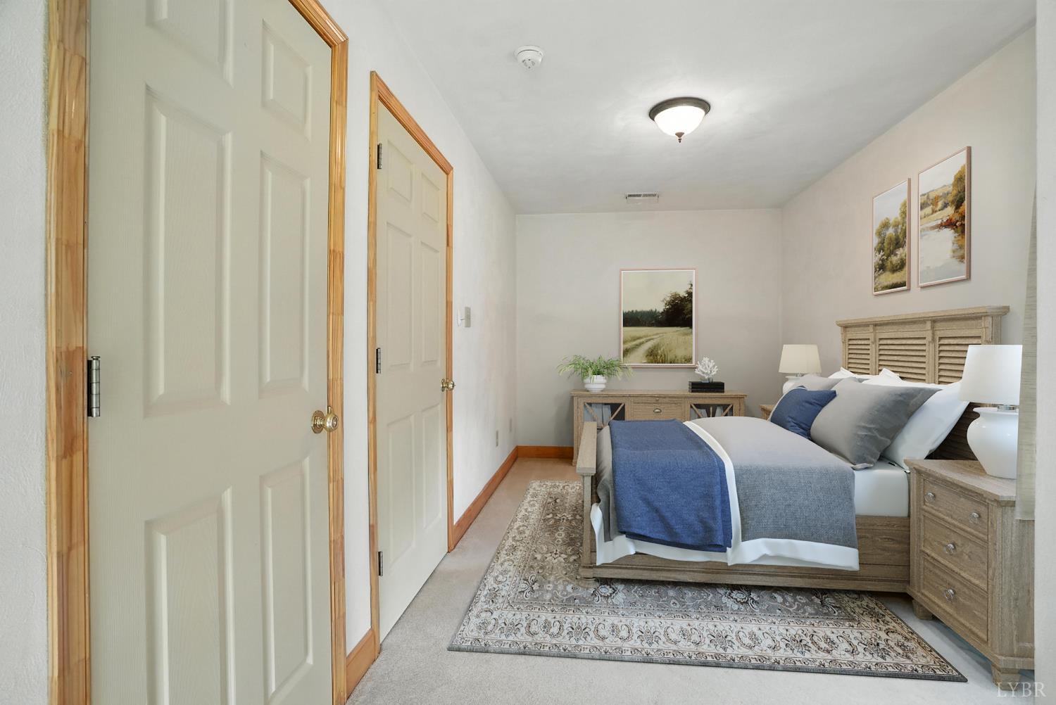 2070 Woodson Road Roseland, VA 22967 - Photo 37 of 76 a bedroom with furniture and a window