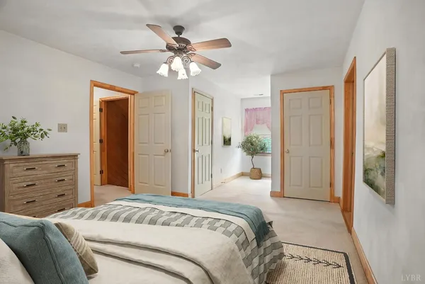 a view of a house with a yard deck and a garden
