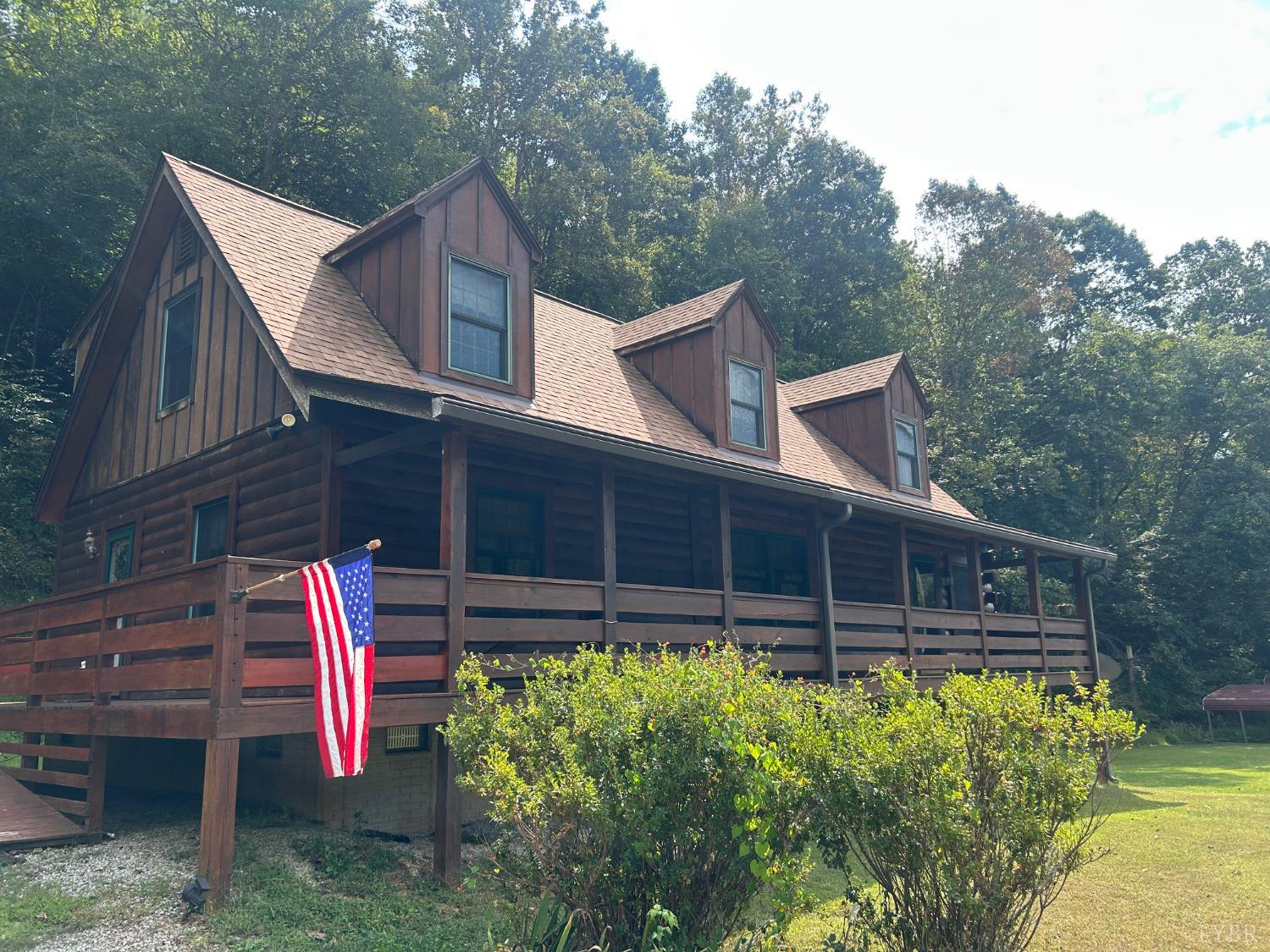 2070 Woodson Road Roseland, VA 22967 - Photo 4 of 76 a front view of a house with a yard