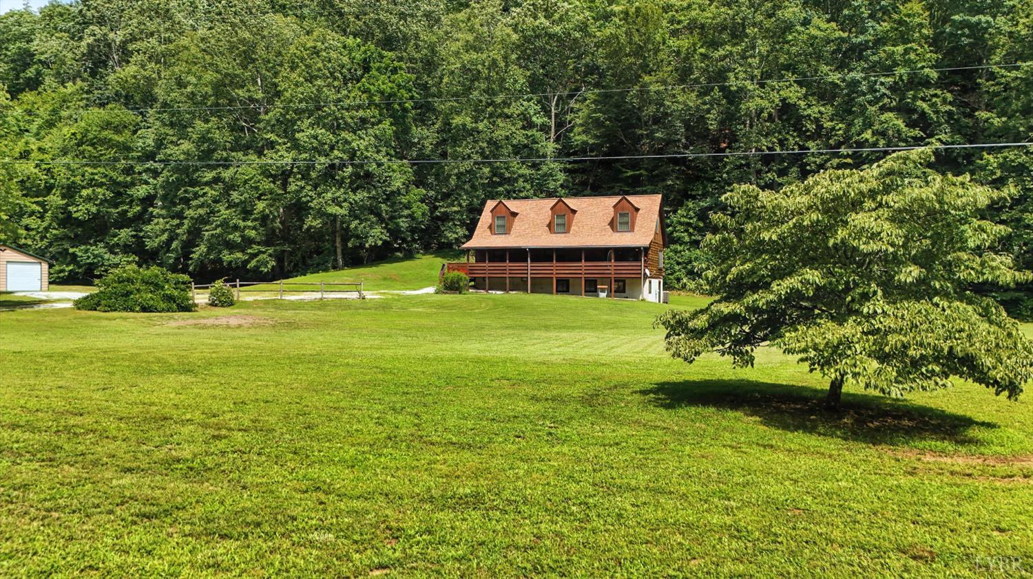 2070 Woodson Road Roseland, VA 22967 - Photo 44 of 76 a view of a large garden with large trees