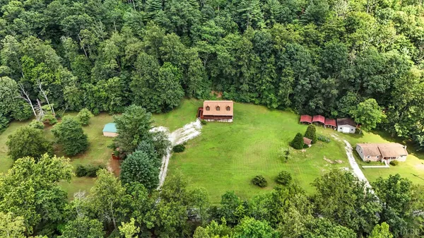 a view of outdoor space with wooden floor and windows