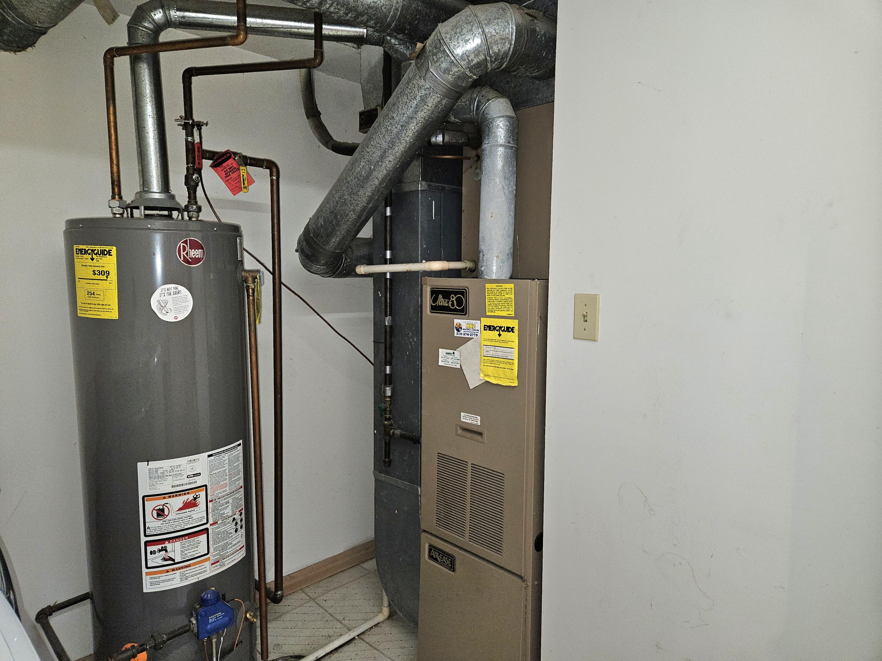 1518 West 96th Place Crown Point, IN 46307 - Photo 30 of 42 a utility room with dryer and washer
