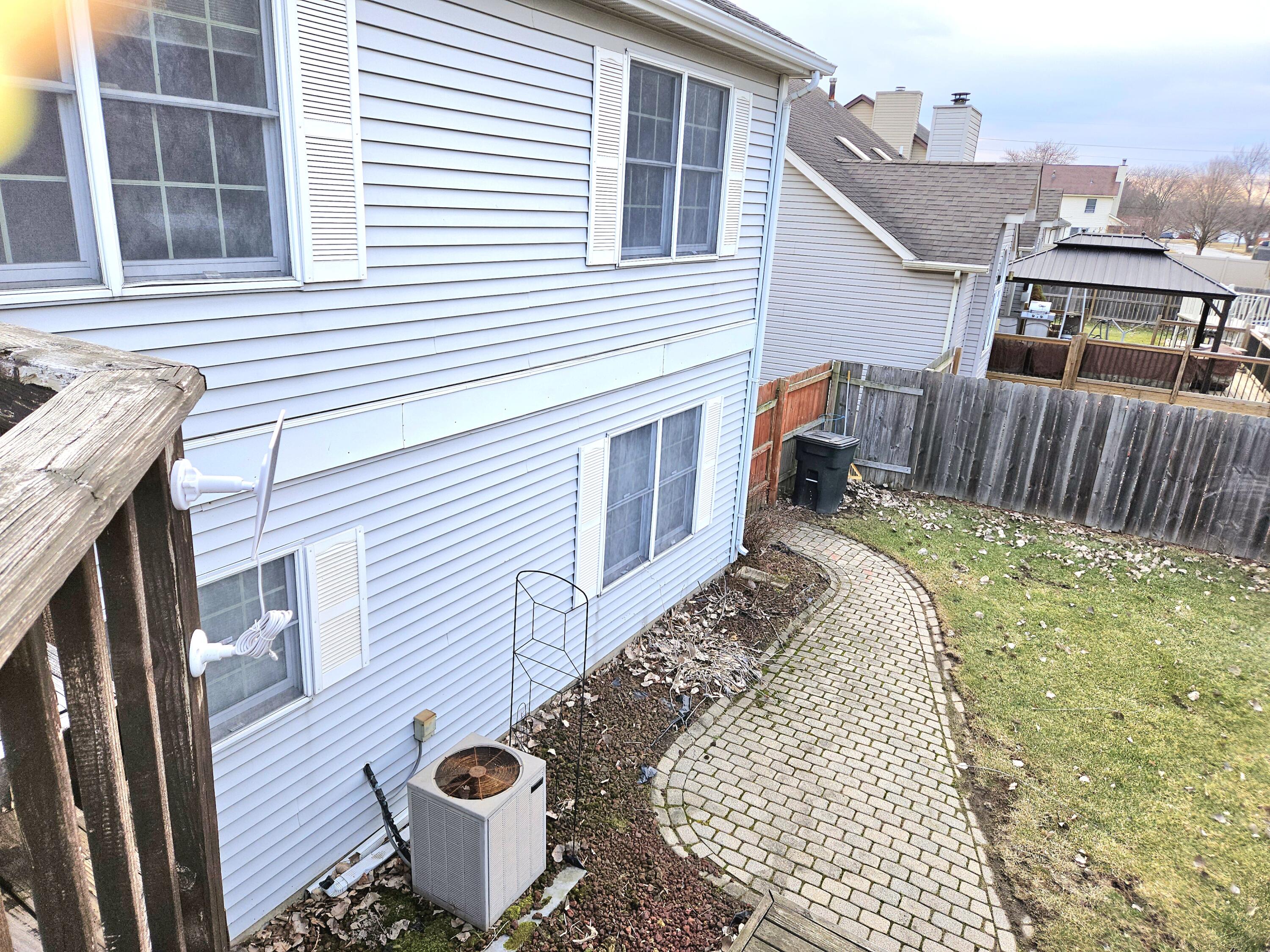 1518 West 96th Place Crown Point, IN 46307 - Photo 38 of 42 a view of a back yard of the house