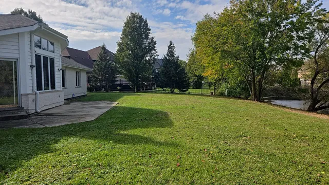 a view of a backyard with a garden