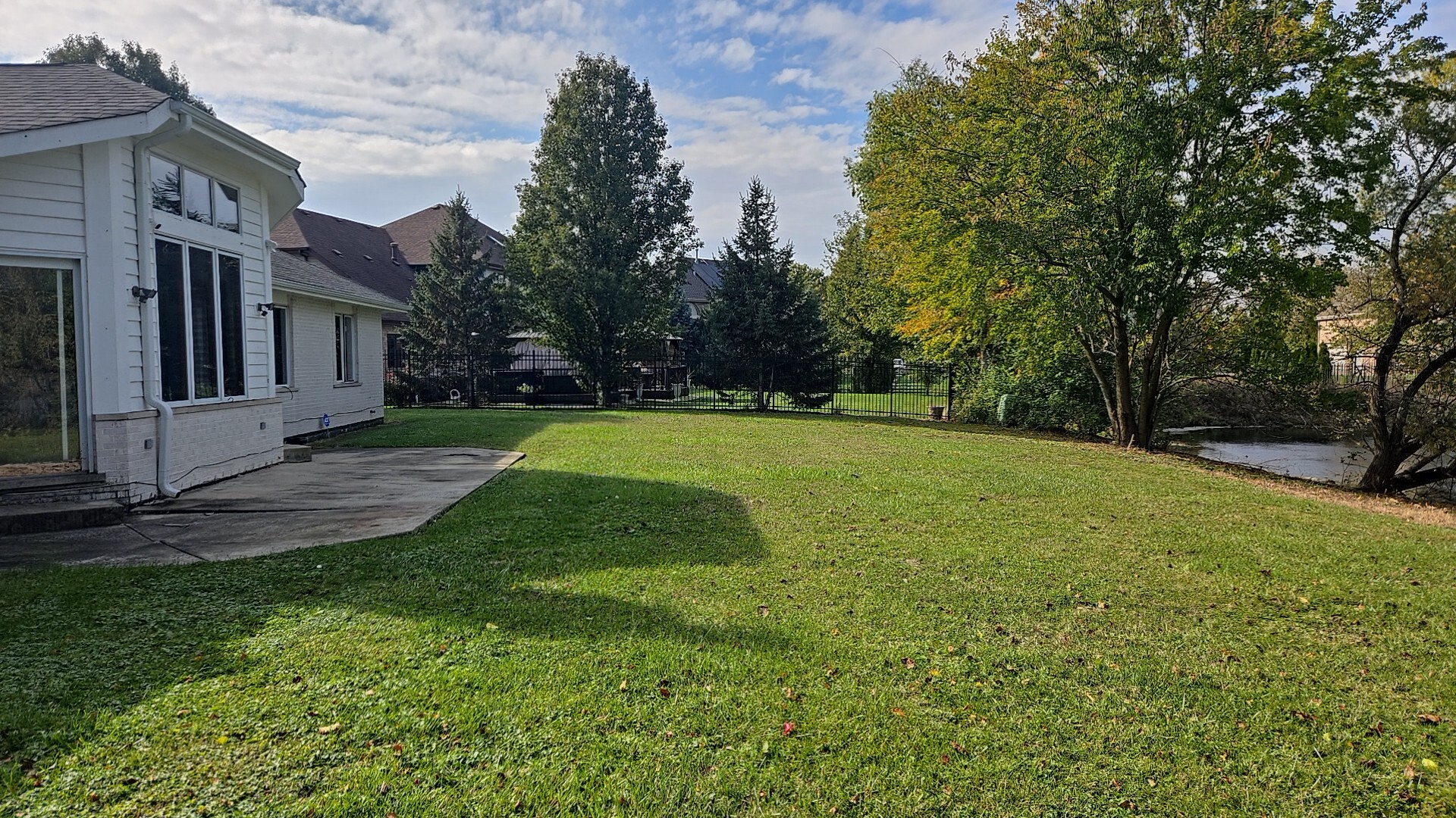 3907 Troon Street Flossmoor, IL 60422 - Photo 6 of 22 a view of a backyard with a garden