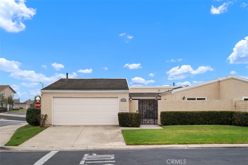 31202 Palma Drive Laguna Niguel, CA 92677 - Photo 2 of 47 a front view of a house with a yard