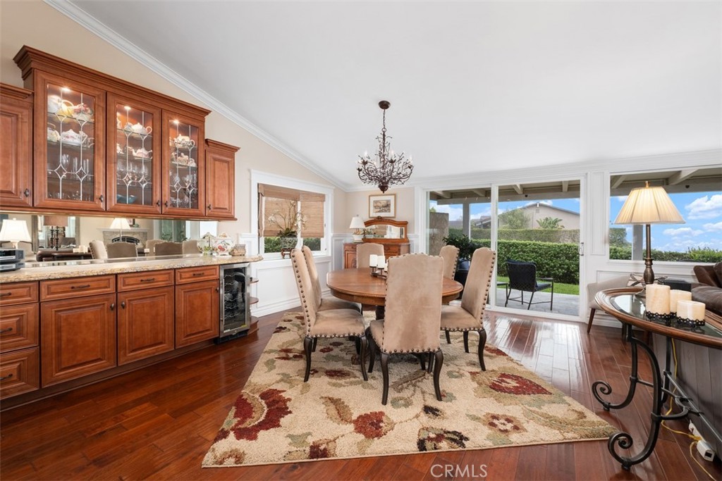 31202 Palma Drive Laguna Niguel, CA 92677 - Photo 24 of 47 a view of a dining room with furniture window and wooden floor