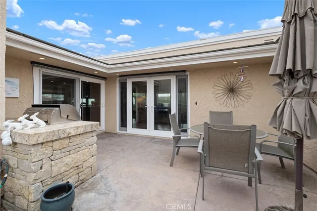 a view of living room kitchen with furniture and outdoor view