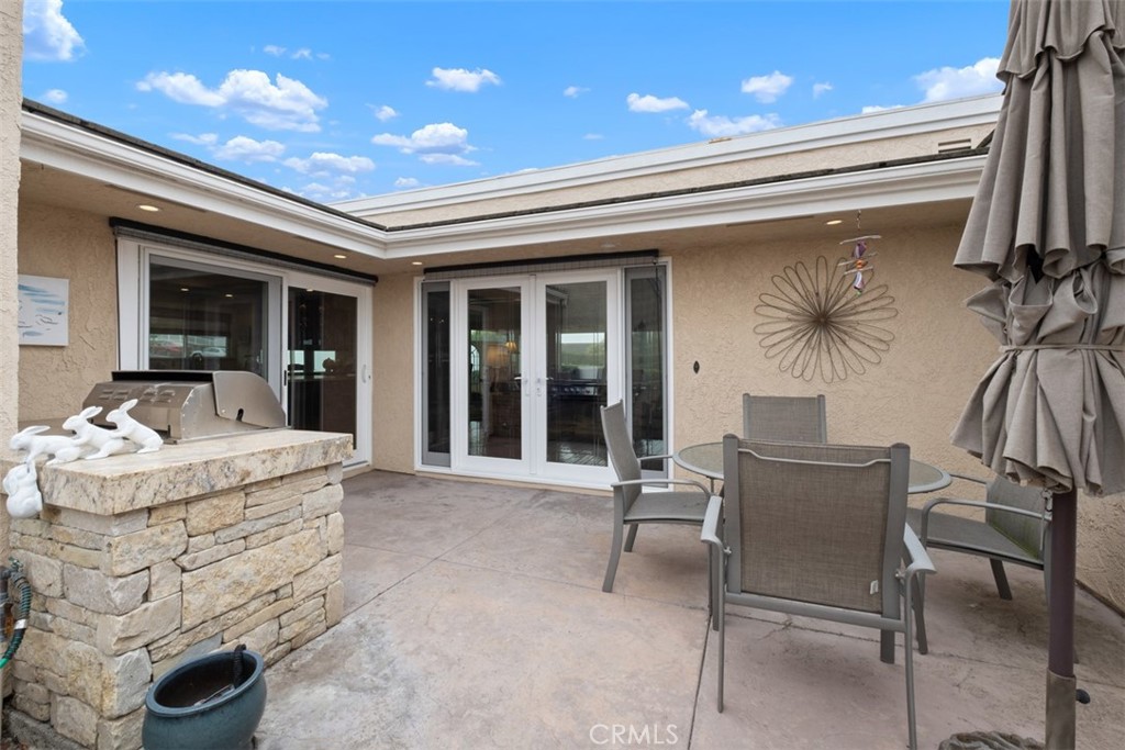 31202 Palma Drive Laguna Niguel, CA 92677 - Photo 7 of 47 a view of living room kitchen with furniture and outdoor view