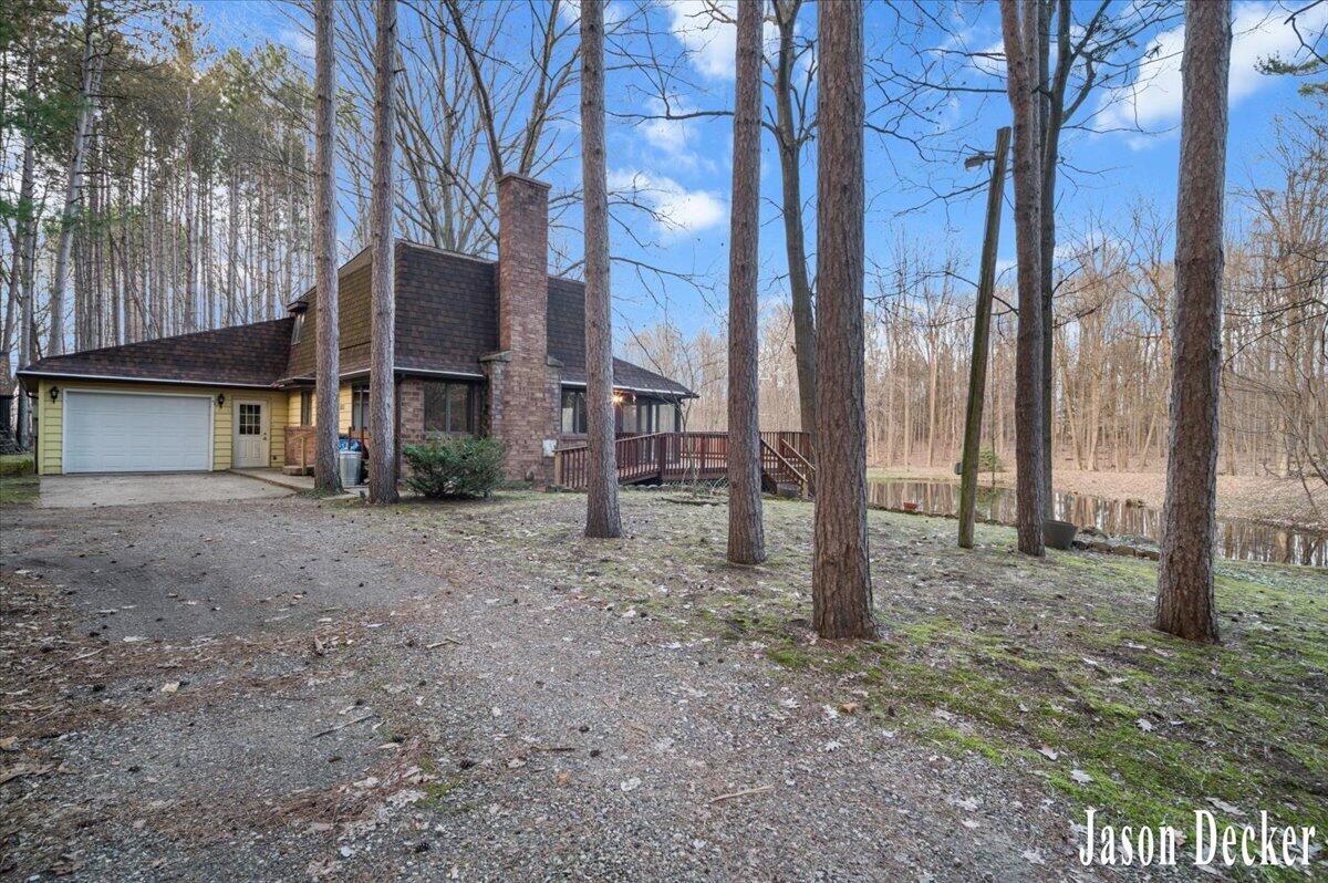 15594 Ritchie Avenue Northeast Cedar Springs, MI 49319 - Photo 3 of 32 22-EXTERIOR 03A