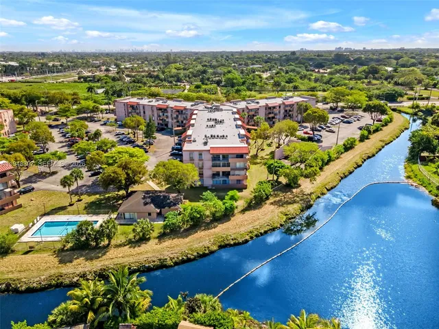 an aerial view of a city with streets and houses