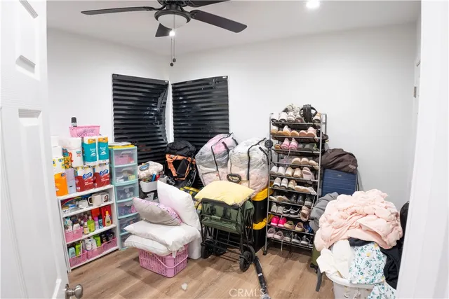 a bedroom with furniture and a window
