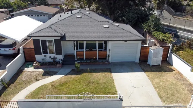 a view of a house with sitting area