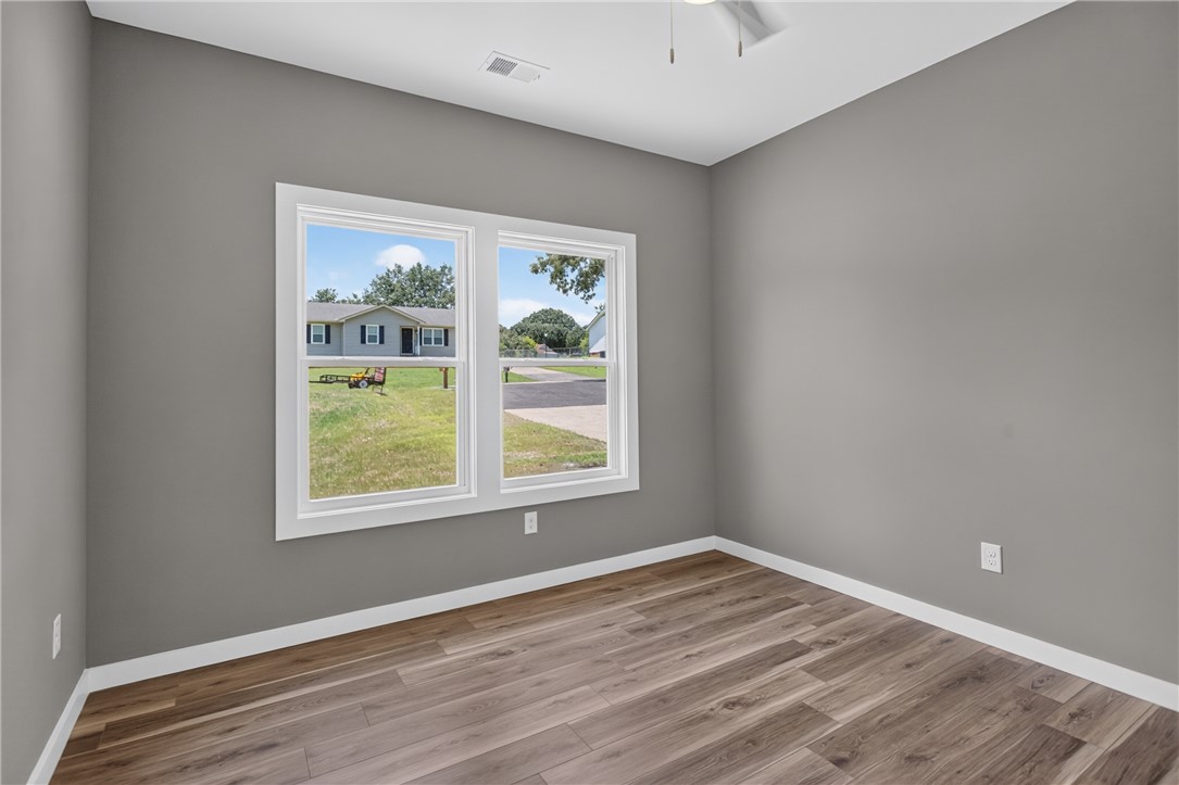 223 Maple Drive Anderson, SC 29621 - Photo 24 of 45 Natural light floods this inviting room with durable, easy-care flooring.