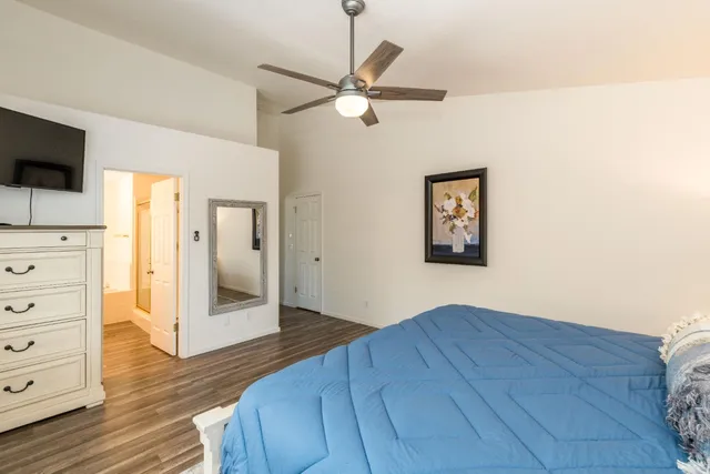 a view of a livingroom with wooden floor