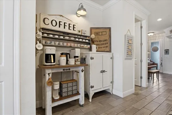 a view of a hallway with entryway door front door