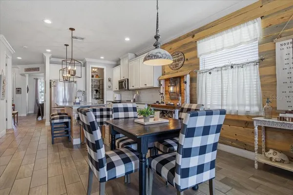 a view of a dining room with furniture