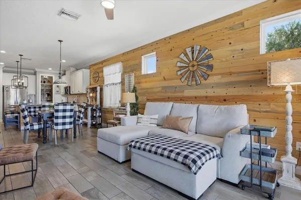 a living room with furniture and a table