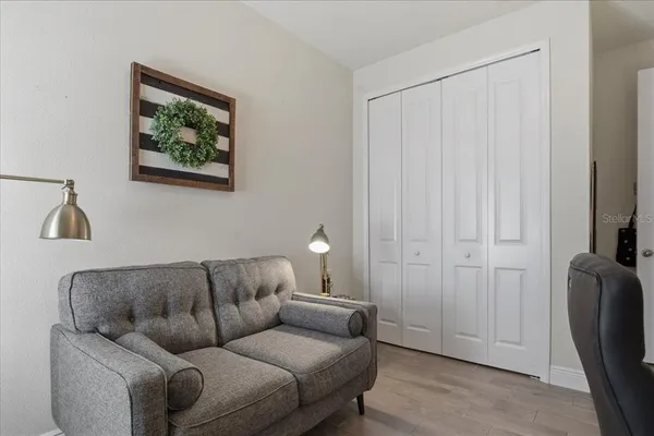 a living room with furniture and a window