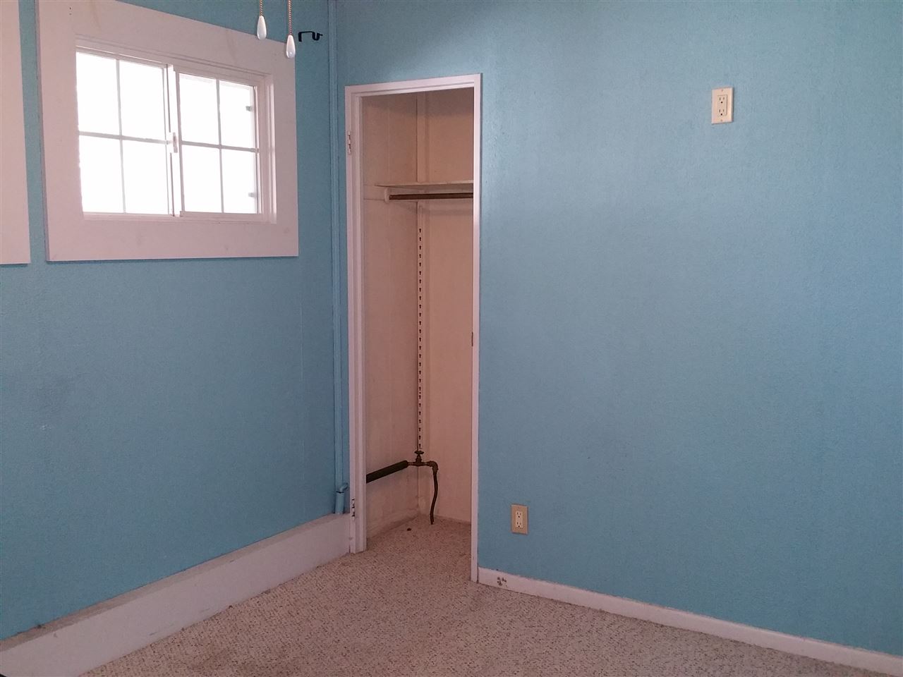 7809 Randy Road Machesney Park, IL 61115 - Photo 11 of 20 an empty room with windows