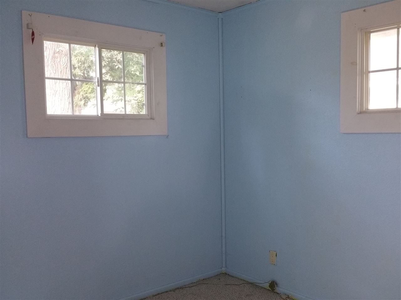 7809 Randy Road Machesney Park, IL 61115 - Photo 13 of 20 an empty room with a window