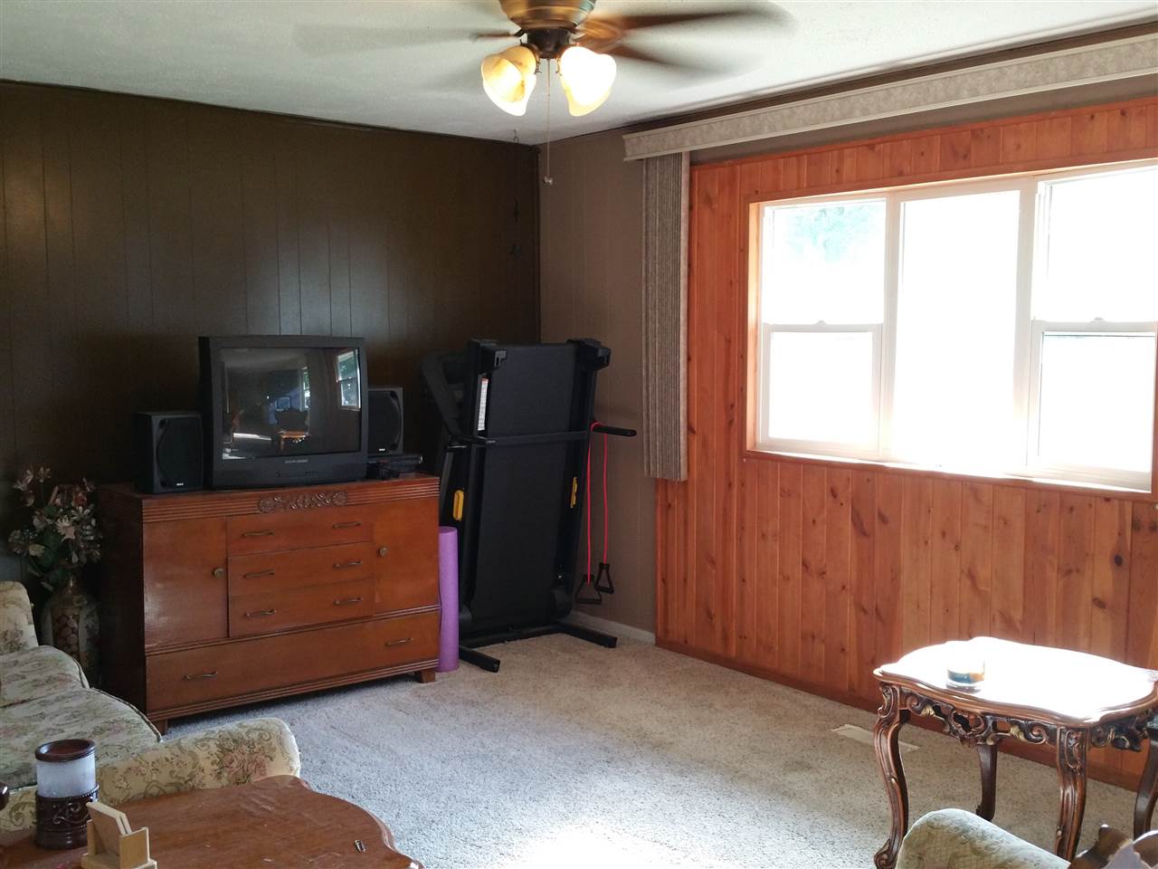 7809 Randy Road Machesney Park, IL 61115 - Photo 4 of 20 a view of a room with furniture and chandelier