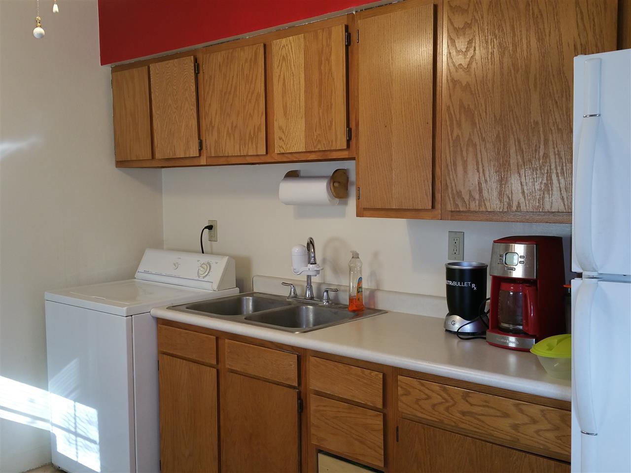 7809 Randy Road Machesney Park, IL 61115 - Photo 8 of 20 a kitchen with a sink and cabinets