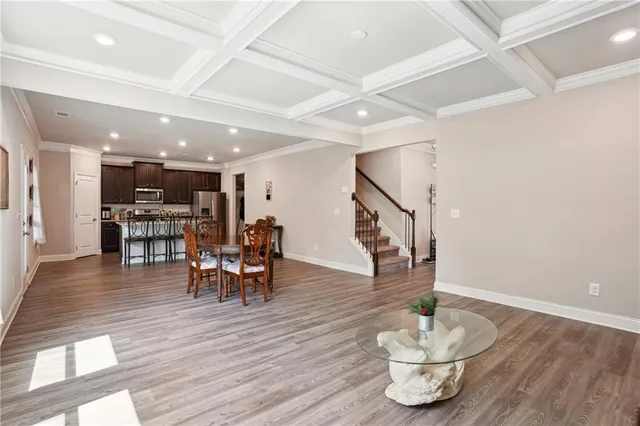 a kitchen with a table and chairs