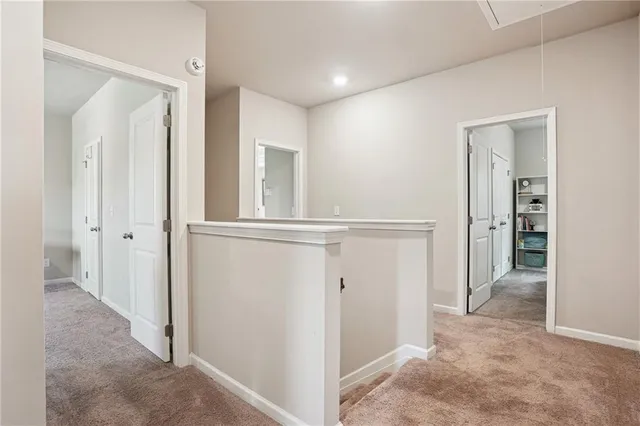 a bedroom with a bed and closet