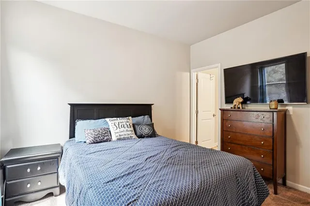 a bathroom with a sink vanity tub and shower