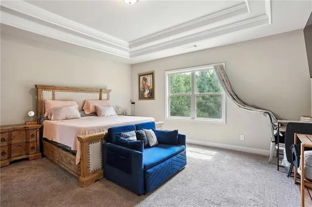 a bedroom with a bed and furniture