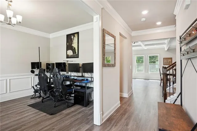 a view of a livingroom with furniture and wooden floor