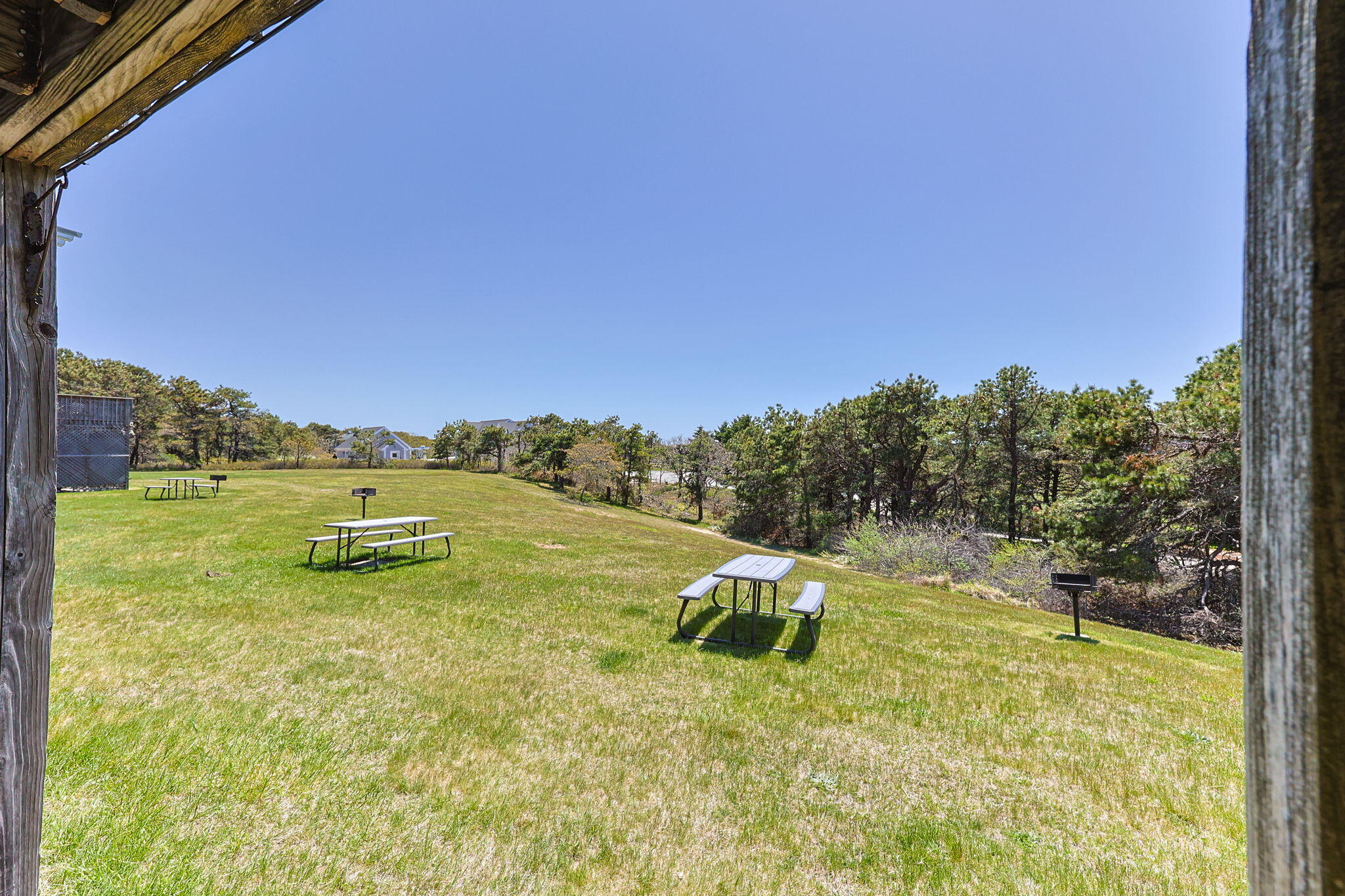 132 Shore Road, Unit 13 Truro, MA 02666 - Photo 18 of 21 a view of a swimming pool with a yard