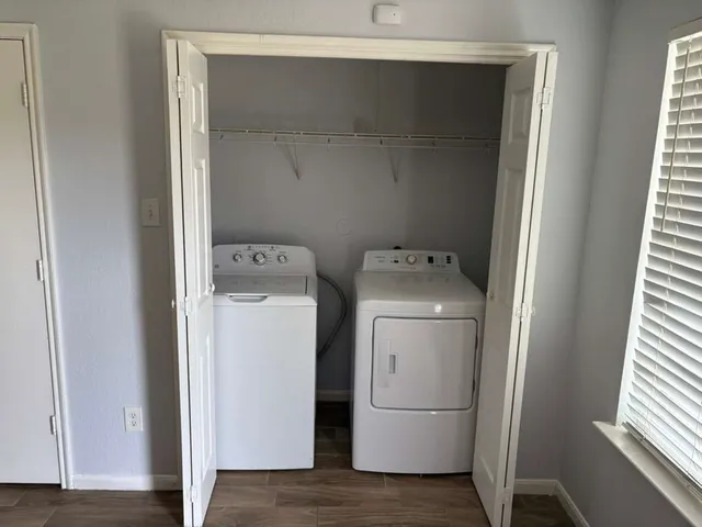 a utility room with dryer and washer