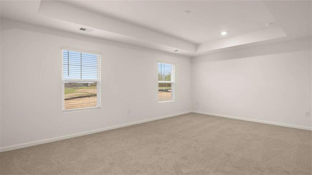 97 Defilippe Drive Statham, GA 30666 - Photo 11 of 58 an empty room with windows