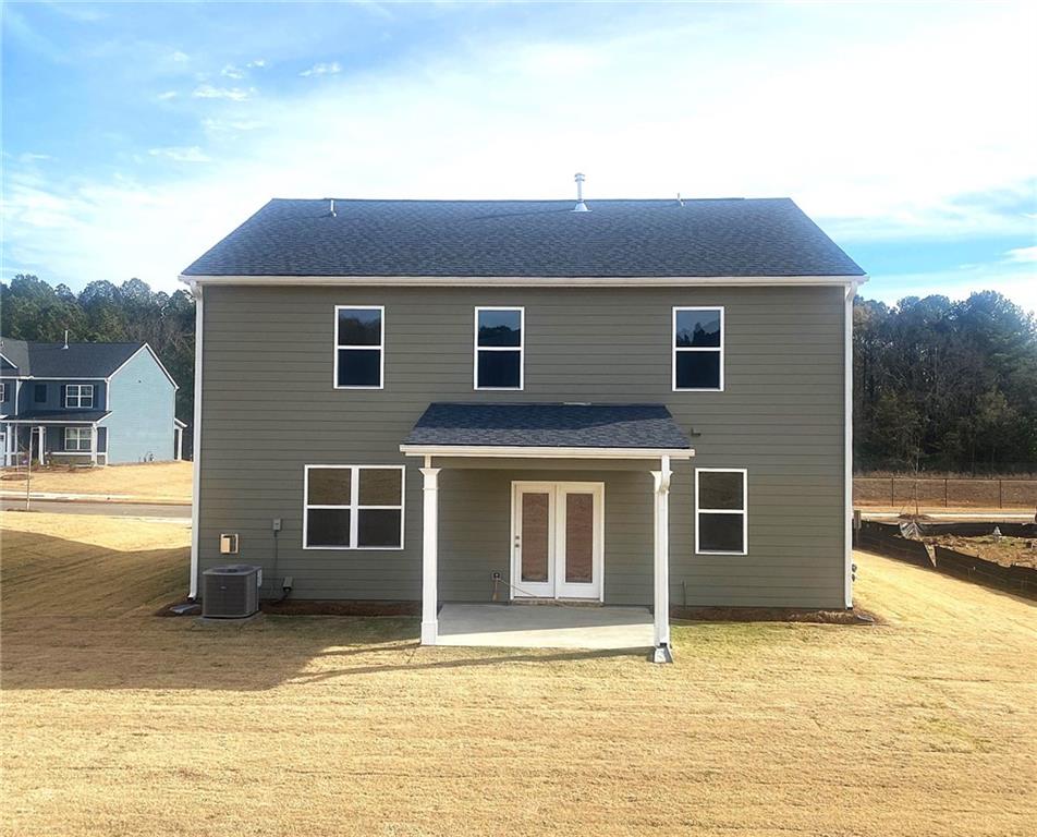 97 Defilippe Drive Statham, GA 30666 - Photo 2 of 58 a house that has a lot of windows in it