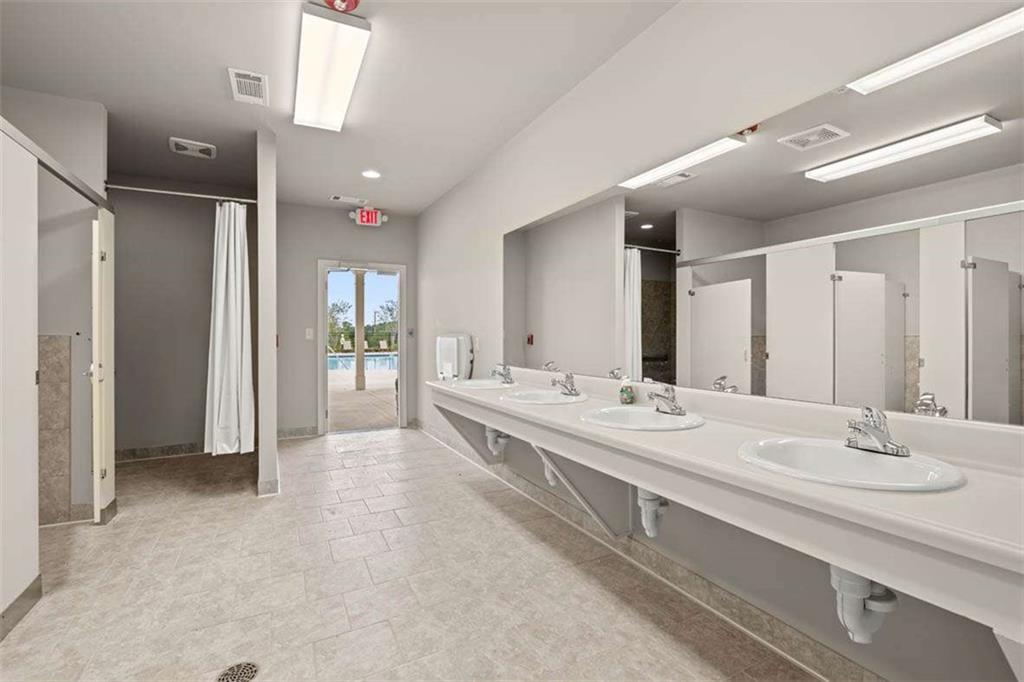 97 Defilippe Drive Statham, GA 30666 - Photo 57 of 58 a large bathroom with a large tub and sink