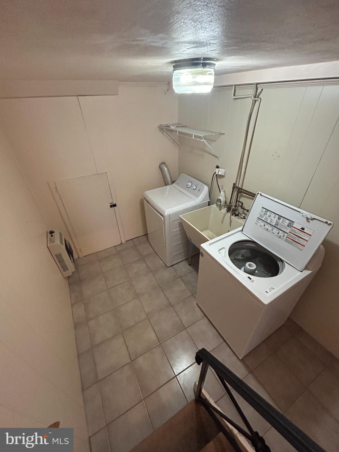 10830 Perrin Road Philadelphia, PA 19154 - Photo 18 of 25 Bright and functional laundry space.