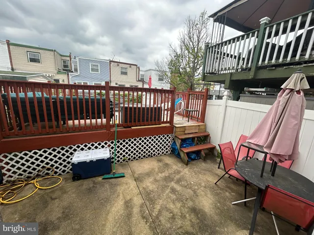 a view of a chairs setting on the roof deck
