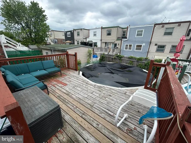 a view of a terrace with furniture