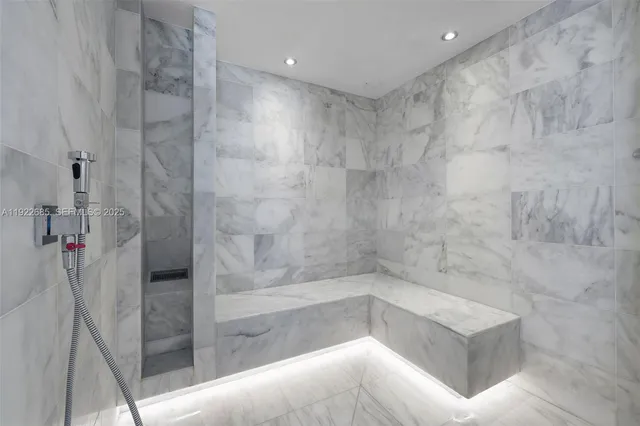 a bathroom with a shower and a bathtub