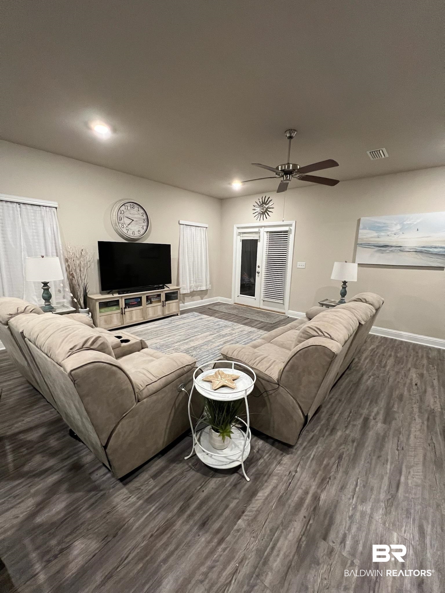 3904 Conrad Court Gulf Shores, AL 36542 - Photo 9 of 24 Living room featuring ceiling fan and dark hardwood / wood-style flooring