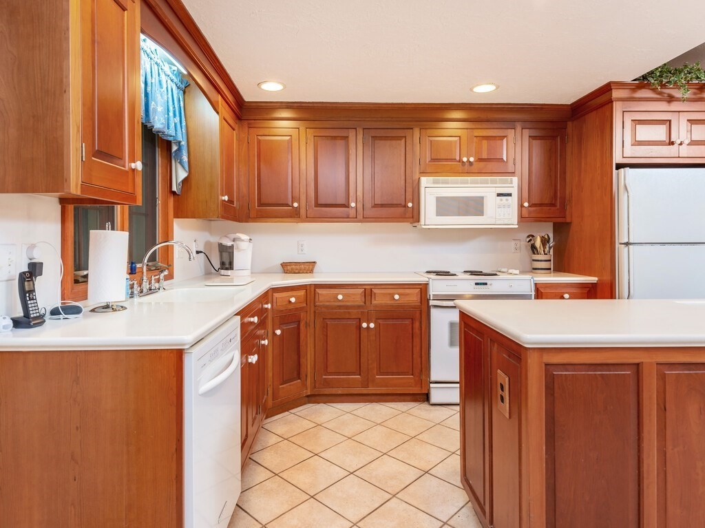 17 Wells Park Road Sturbridge, MA 01566 - Photo 11 of 37 a kitchen with stainless steel appliances granite countertop a sink and a stove