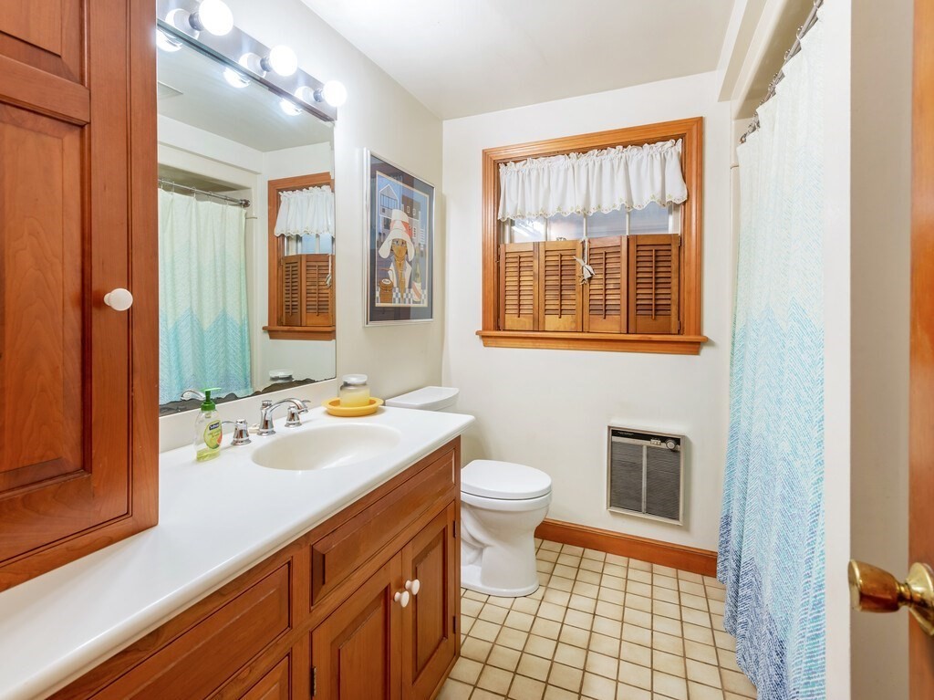 17 Wells Park Road Sturbridge, MA 01566 - Photo 19 of 37 a bathroom with a sink a toilet and shower