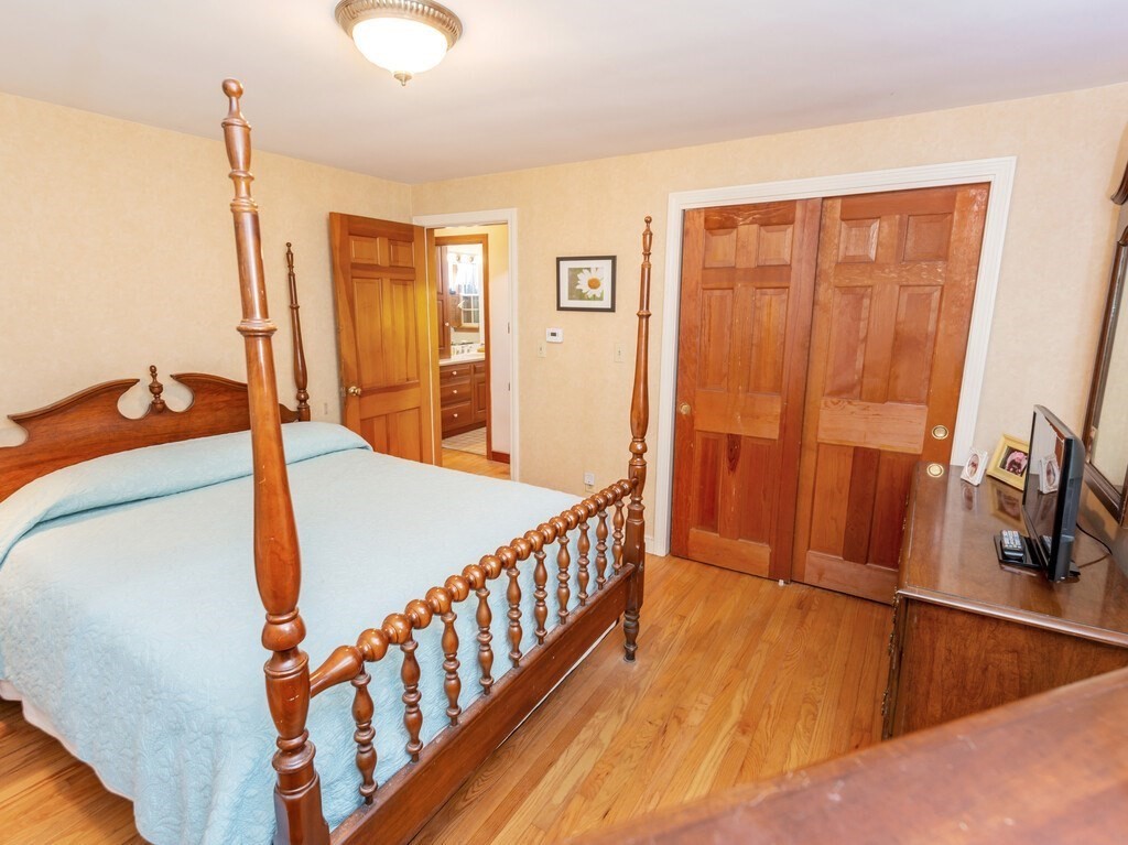 17 Wells Park Road Sturbridge, MA 01566 - Photo 20 of 37 a view of a bedroom with furniture and staircase