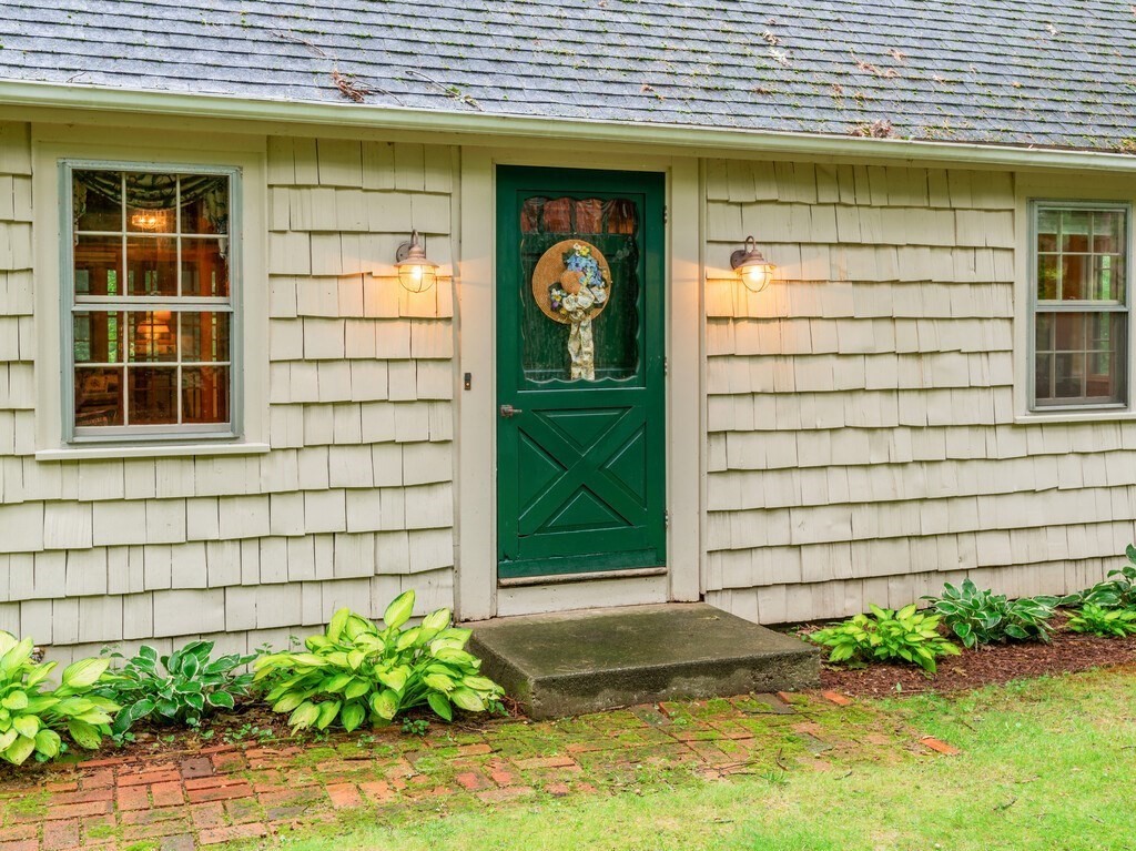 17 Wells Park Road Sturbridge, MA 01566 - Photo 2 of 37 a front view of a house with a yard