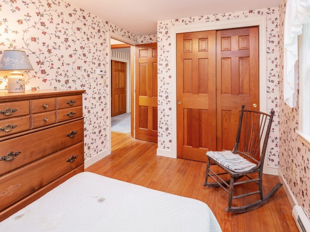 17 Wells Park Road Sturbridge, MA 01566 - Photo 26 of 37 a living room with furniture and wooden floor