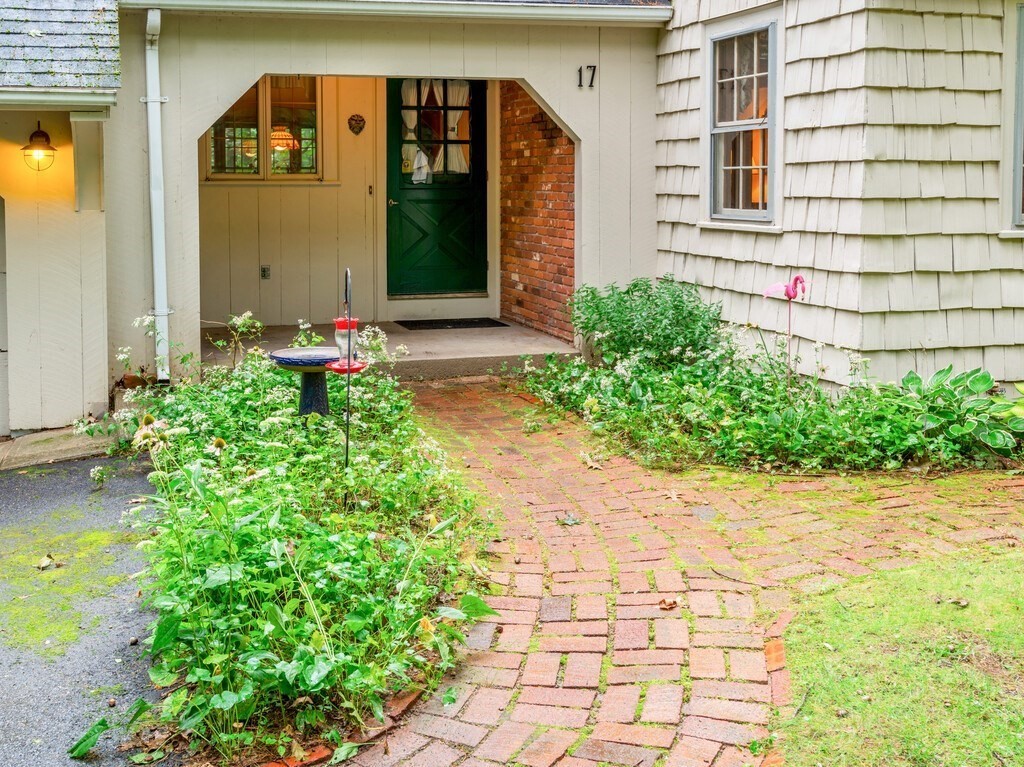 17 Wells Park Road Sturbridge, MA 01566 - Photo 3 of 37 a front view of a house with a yard