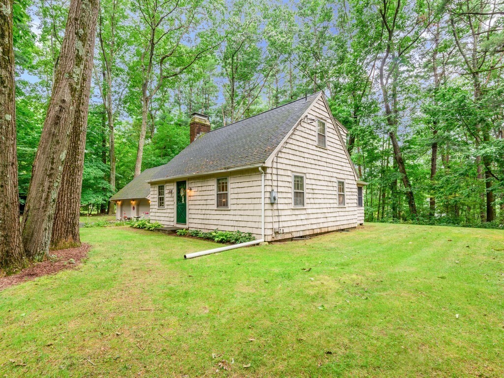 17 Wells Park Road Sturbridge, MA 01566 - Photo 31 of 37 a view of a backyard with large trees