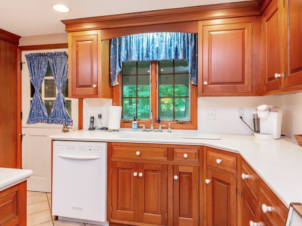 17 Wells Park Road Sturbridge, MA 01566 - Photo 10 of 37 a kitchen with stainless steel appliances granite countertop a sink and a cabinets